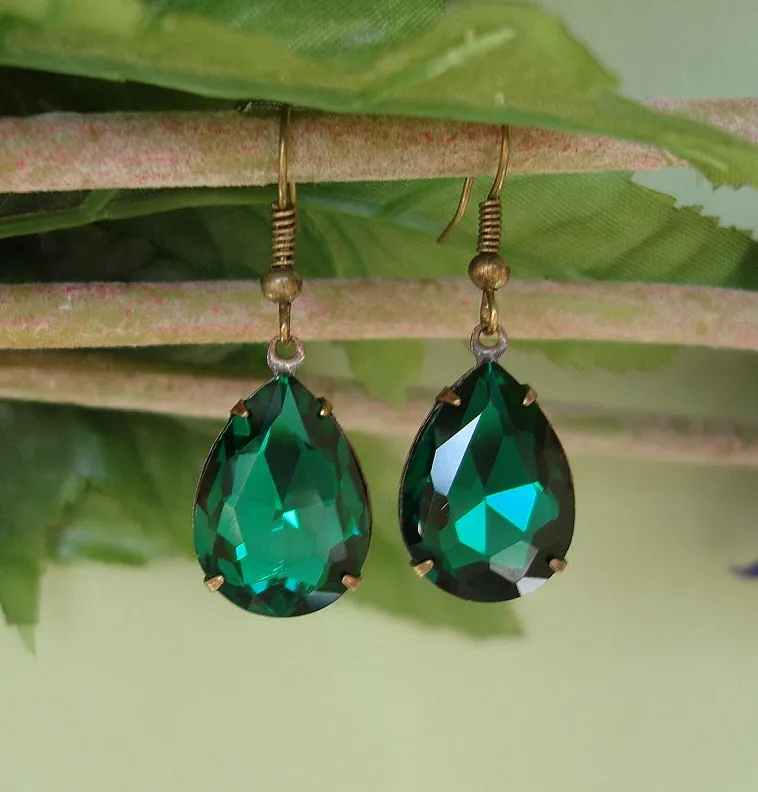 Vintage Emerald Swarovski Teardrop In Antiqued Brass Prong Settings.